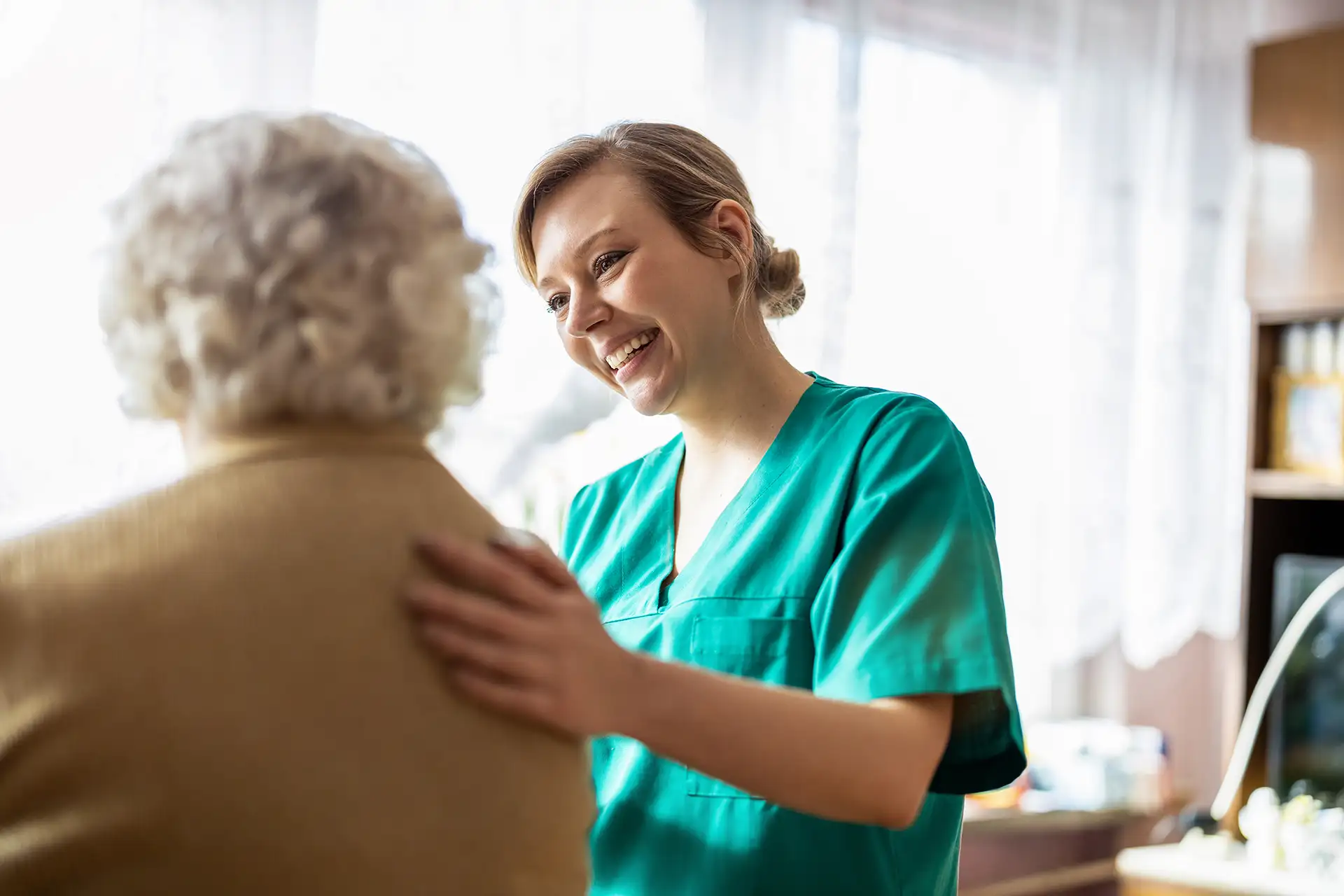 A Nexia care manager talking a family through residential aged care options and funding